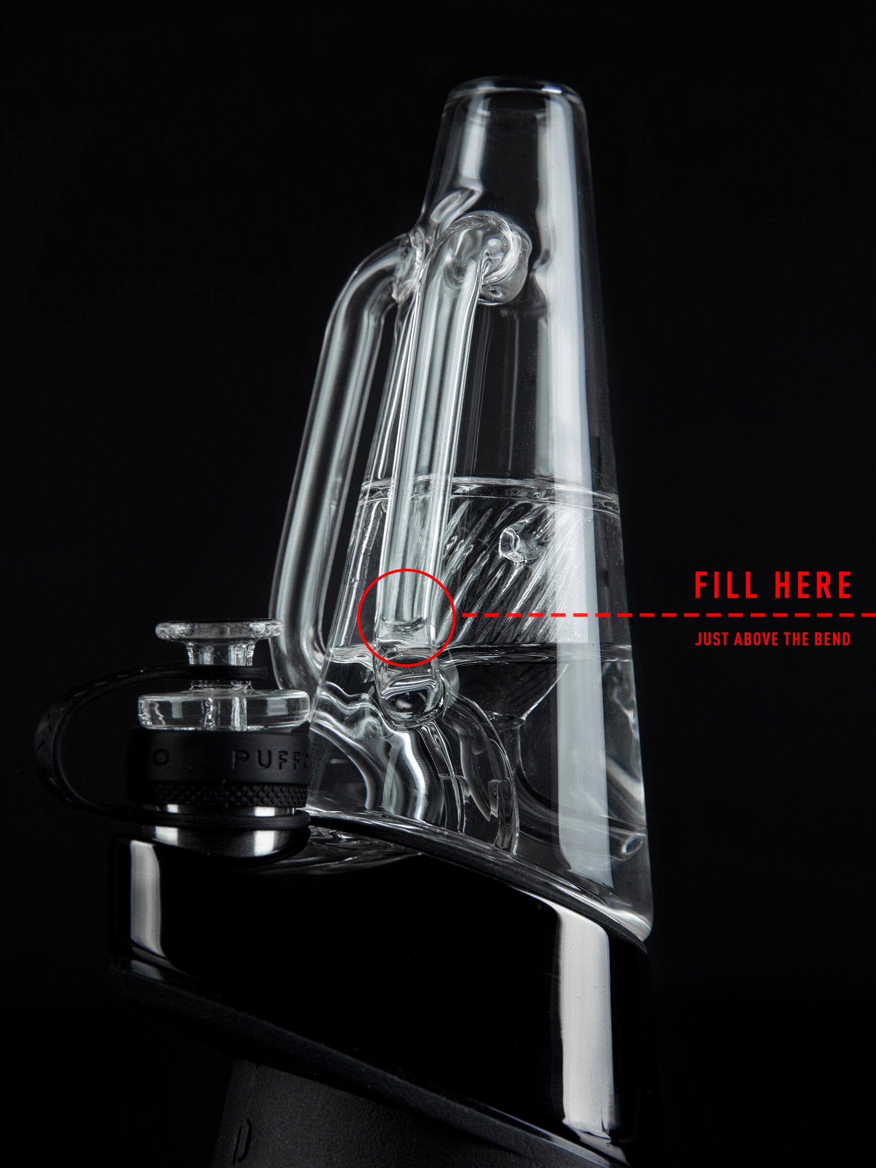 Angled front shot of Ryan Fitt glass with red text indicating "Fill Here" against black backdrop
