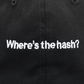 Close up shot of "Where's the hash?" text on black hat with white logo