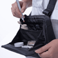 Close up of a person wearing a black Puffco Proxy travel bag with open tray compartment and protective padding filling a beige travel pipe using hot knife