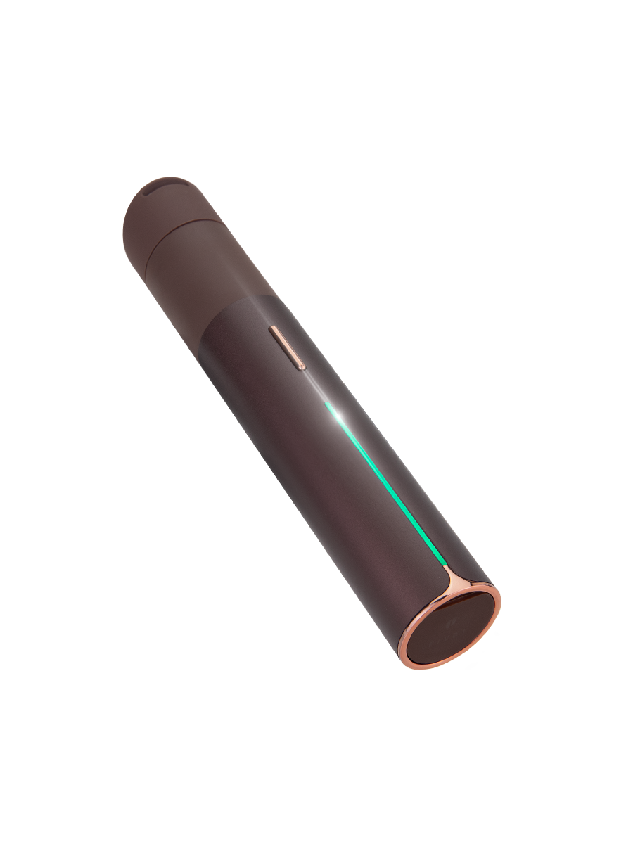 black dab pen at a an angle against a black background
