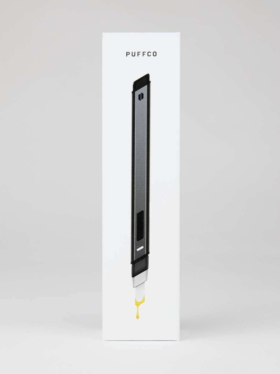Puffco hot knife dab tool white packaging with black electric hot knife and dripping extract